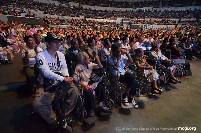 Right before the stage, disabled persons seat in front of the huge crowd at the Smart-Araneta Coliseum for the Worldwide Bible Exposition of MCGI on October 30, 2014 in celebration of The Old Path's 34th anniversary. (Photo courtesy of PVI)