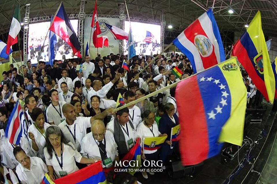 Rows of delighted brethren who represented their countries with their flags comprised the parade of colors on the first day of the International Thanksgiving to God. (Photo courtesy of Photoville International) 