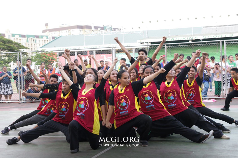 A group of Youth Ministry members from Metro Manila pose proudly after finishing their cheerdance entry. Photo by Photoville International)