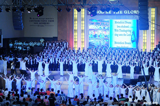 MCGI members in the ADD Convention Center in Apalit, Pampanga unitedly sing songs of praises to God during the second quarterly International Thanksgiving to God (ITG) celebration held on July 3-4, 2015. [Photoville International]