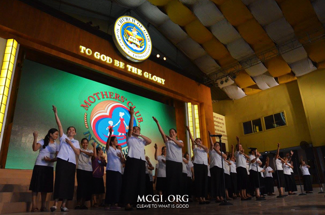 Mothers' Club members sing and dance on the ADD Convention Center stage. (Photo provided by Photoville International)